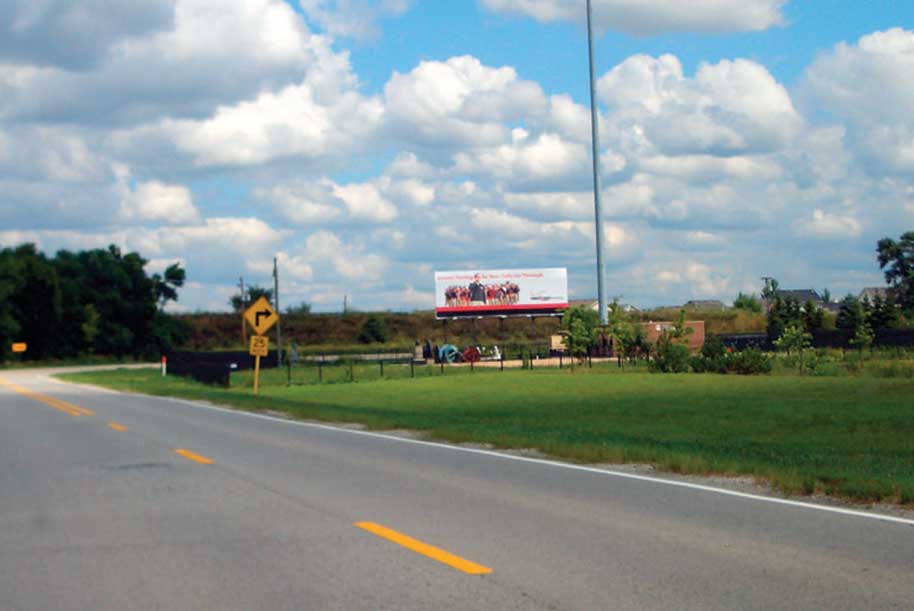 Billboard at East side of Frontage Road at Airport Road